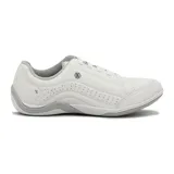 Championes Kolosh de mujer color blanco, con cordones y detalles de perforaciones en el lateral.