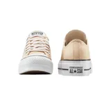 Championes Converse Chuck Taylor All Star Lift Platform, color beige con plataforma blanca y detalles en negro.