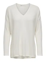 Sweater de punto color blanco hueso, con escote en V y calce ajustado.