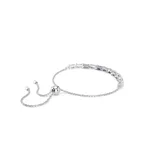 Pulsera de rodio con cierre deslizante, decorada con Swarovski Zirconia en tonos que van del transparente al morado, diseño en talla escalonada octogonal.