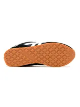 Zapatillas urbanas Seventy8 negras con detalles en blanco, cordones blancos y logo blanco en el lateral.