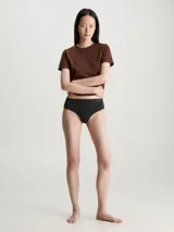 Colaless negro de talle alto Calvin Klein, confeccionado en microfibra elástica sin costuras, con logo en la cintura y refuerzo de algodón.