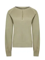 Sweater color crudo de lana con cuello redondo y abertura frontal con botones de madera.