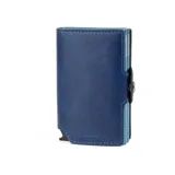 Billetera azul de cuero genuino con doble caja de aluminio para tarjetas y tecnología RFID.