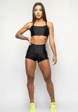 Top deportivo negro de poliamida y elastano, con forro y breteles finos.