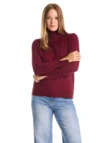 Polera tejida en hilado fino color verde oscuro, de manga larga con tajo en el puño y cuello alto.