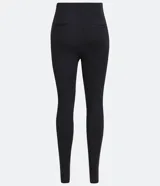 Pantalón negro de corte skinny confeccionado en tejido de punto roma. Diseño de sastrería con costuras frontales y cierre lateral con cremallera.