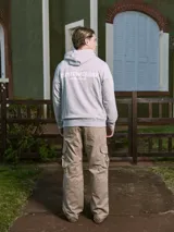 Canguro gris melange con capucha, mangas largas y bolsillo tipo canguro. Estampado en la espalda con la inscripción "Oakwood Nine Zero 90291 LA County".