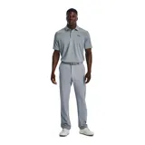 Chomba Under Armour Tech Polo para hombre, de color negro con logo en el pecho y detalles en gris en el cuello. Confeccionada con tejido UA Tech™ de secado rápido y corte holgado.