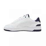 Championes Puma CA Match de cuero blanco con detalles en azul marino y logo dorado.