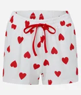 Conjunto de pijama short doll de algodón con estampado de High School Musical. Incluye una remera de manga corta con cuello redondo y un short con cintura elástica.