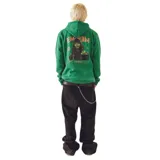 Canguro verde con capucha y cordones ajustables, bolsillo tipo canguro y estampado frontal con la frase "Guess Who's Back".