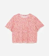 Blusa de tul estampada con cuello redondo y mangas cortas.