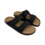 Sandalias negras con dos tiras anchas con costuras en forma de X, plantilla de corcho y suela de goma.