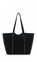 Bolso tipo tote bag negro con textura tipo gamuza y detalles de tachas plateadas en los laterales.