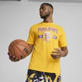 Remera amarilla de algodón con cuello redondo y estampado al frente con el logo de Puma Hoops y un tigre con una pelota de básquet.