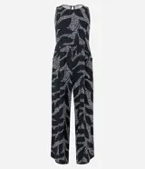 Mono largo sin mangas de viscosa twill color negro con estampado de follaje en blanco. Tiene cuello redondo, cierre con botón en la espalda y bolsillos laterales.