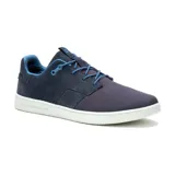 Zapatillas Caterpillar Pause Canvas color azul marino con cordones azules y suela blanca.