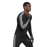 Remera de entrenamiento Adidas TechFit negra de manga larga con tres rayas blancas en los hombros y logo blanco en el pecho.