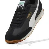 Championes Puma Easy Rider Vintage, color negro con detalles en blanco y suela marrón.