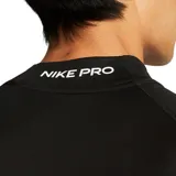 Remera deportiva Nike Pro de manga larga, color negro, con cuello alto y logo en el pecho.