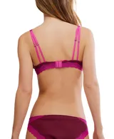 Bralette negro con base de algodón suave y escote profundo, terminado con bordes de encaje color crema.