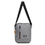 Bolso cruzado Caterpillar modelo Shoulder Bag, color gris medio, con correa ajustable negra y compartimento principal con cierre vertical. Presenta el logo CAT en la parte inferior frontal y una etiqueta amarilla con el nombre CATERPILLAR en el lateral.