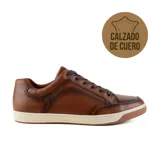 Zapato casual de cuero marrón, diseño sencillo con cordones y suela blanca, ideal para diversas ocasiones.