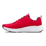 Championes Under Armour Charged Commit TR 4, color gris claro con logo negro y suela blanca.