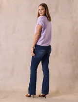 Buzo tejido color lila, marca Ninety. Escote en V. Calado en escote y delantera.