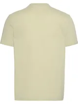 Remera color crema de corte recto, cuello redondo y mangas cortas. Estampado frontal con el logo de Calvin Klein Jeans en negro.