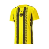 Camiseta de fútbol Puma TeamLIGA Striped del Club Atlético Peñarol, color amarillo con rayas verticales negras, logo de Puma bordado en el pecho y escudo del club.