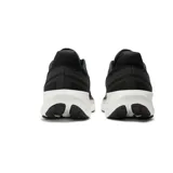 Championes de running New Balance Fresh Foam 1080v12, color negro con detalles en dorado. Cuentan con amortiguación Fresh Foam X, empeine de punto técnico Hypoknit y sujeción estratégica.