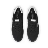 Championes Adidas 3MC negros con detalles en blanco.
