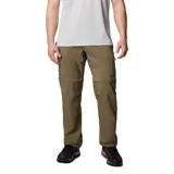 Pantalón largo convertible en short, color caqui, de corte recto y tiro medio. Cuenta con bolsillos laterales con cierre, bolsillos cargo con velcro y cintura parcialmente elástica con cinturón removible.