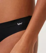 Bombacha bikini negra de microfibra con corte láser y forro de algodón.