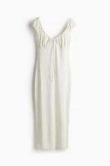 Vestido midi ajustado de punto elástico con estampado floral, manga japonesa elástica y escote en V con cordón para ajustar.