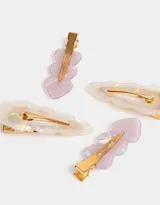 Set de cuatro hebillas para el pelo de resina en tonos tornasol, con forma de nube y corazón.
