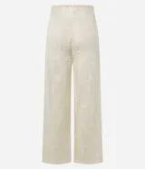 Pantalón de playa blanco de encaje floral con cintura elastizada ajustable con cordón.