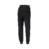Pantalón de jogging negro con puños ajustados, cintura elástica con cordón y logo de Topper estampado en blanco en el muslo izquierdo.