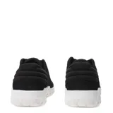 Zapatillas Caterpillar Hex + de corte bajo, color negro, con capellada de gamuza y detalles acolchados en el cuello. Cuentan con cordones negros y una suela gruesa de goma blanca con relieve de panal de abeja.