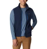 Chaleco de polar Columbia Fast Trek para hombre, color azul marino con cierre y detalles en azul eléctrico. Cuenta con cuello alto, bolsillos laterales con cierre y bolsillo en el pecho con cierre.