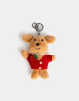 Llavero de peluche con forma de perro color beige, vestido con un sweater rojo y un collar de perlas.