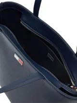 Bolso tote azul marino de Tommy Jeans, con doble asa de hombro y logo de la marca estampado en el frente.