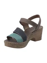 Sandalias con plataforma de corcho, tiras de cuero en color negro, marrón y amarillo.