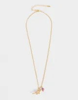 Set de dos collares dorados para compartir, con dije metálico de dinosaurio y corazón imantado.