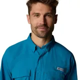 Camisa de manga larga Columbia Shadowcaster Zero para hombre, color azul. Confeccionada con tejido transpirable de secado rápido, protección UV, tecnología refrescante y absorción del sudor. Cuenta con cuello de protección solar, ventilación, mangas enrollables, bolsillos de seguridad, parche de limpieza para gafas de sol, portacañas y bucle de utilidad.