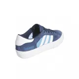 Zapatilla de skate de lona en color azul marino, con detalles en blanco y suela vulcanizada para gran agarre.