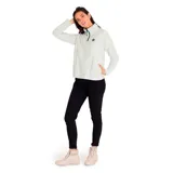 Buzo polar de mujer Caterpillar color blanco, con cierre parcial con cremallera verde y logo de la marca en el pecho. Cuenta con bolsillos laterales.