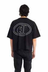 Remera boxy fit de color gris oscuro, confeccionada en 100% algodón, con un corte moderno y cómodo.
